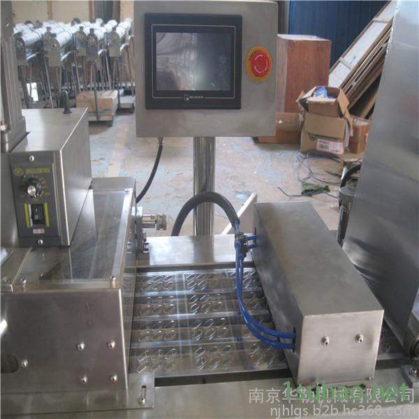 直销DPP-140A奶片泡罩包装机  自动铝塑泡罩包装机   胶囊泡罩成型机厂家图2