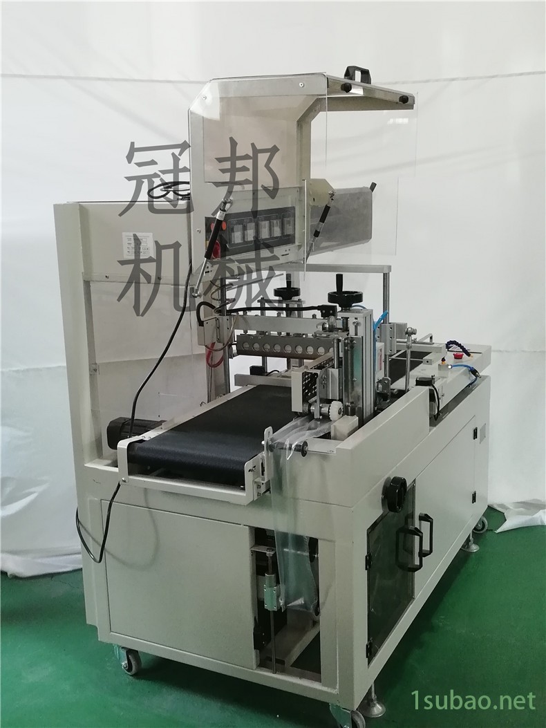 威海海带丝包装机 粉丝套膜包装机 面条覆膜包装机 菜板覆膜包装机 红酒覆膜包装机 洗发水包装机 沐浴露包装机 冠邦机械图2